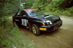 Pat Moro / Neil Smith Subaru WRX at a 90-right on SS13, Indian Creek.