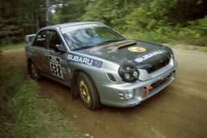 Robert Borowicz / Mariusz Malik Subaru WRX at a 90-right on SS13, Indian Creek.