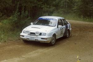 Colin McCleery / Bill Westrick Ford Merkur XR4Ti at a 90-right on SS13, Indian Creek.