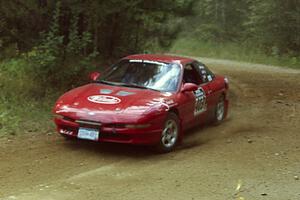 Erick Nelson / Barry Ptak Ford Probe GT at a 90-right on SS13, Indian Creek.