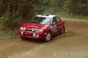 Scott Parrott / Breon Nagy Dodge Neon at a 90-right on SS13, Indian Creek.