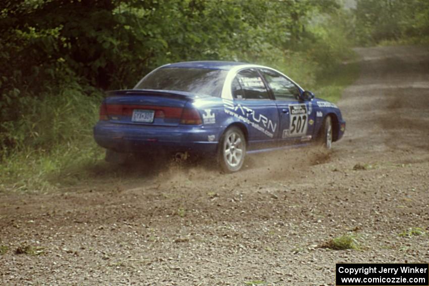 Micah Wiitala / Jason Takkunen Saturn SL2 at the SS9 (Heart Lake) spectator area.