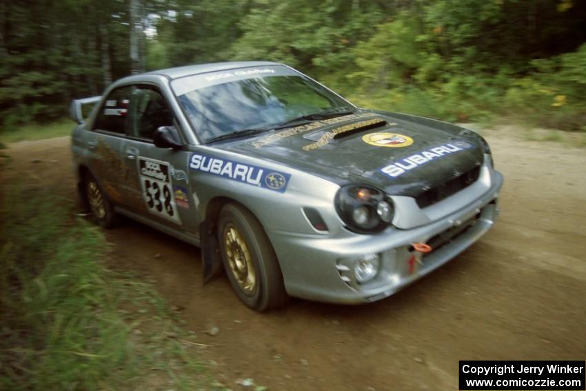 Robert Borowicz / Mariusz Malik Subaru WRX at a 90-right on SS13, Indian Creek.