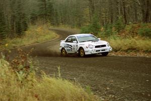 Jonathan Bottoms / Carolyn Bosley Subaru WRX near the start of SS1, Herman.