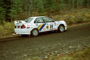 Pete Lahm / Bill Westrick Mitsubishi Lancer Evo IV near the start of SS1, Herman.