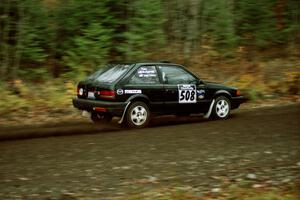 Tom Ottey / Pam McGarvey Mazda 323GTX near the start of SS1, Herman.