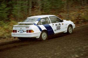 Colin McCleery / Nancy McCleery Ford Merkur XR4Ti near the start of SS1, Herman.