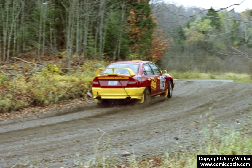 Dennis Martin / Kim DeMotte Mitsubishi Lancer Evo IV near the start of SS1, Herman.