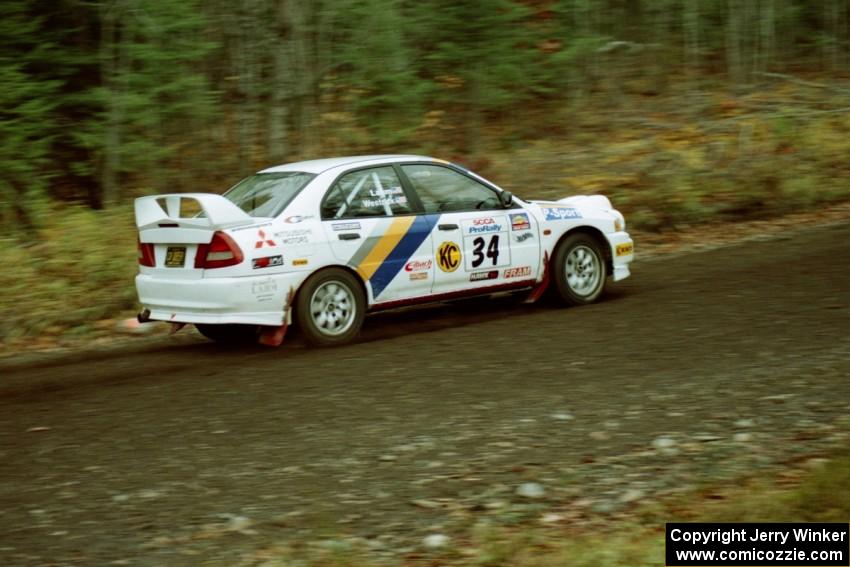 Pete Lahm / Bill Westrick Mitsubishi Lancer Evo IV near the start of SS1, Herman.