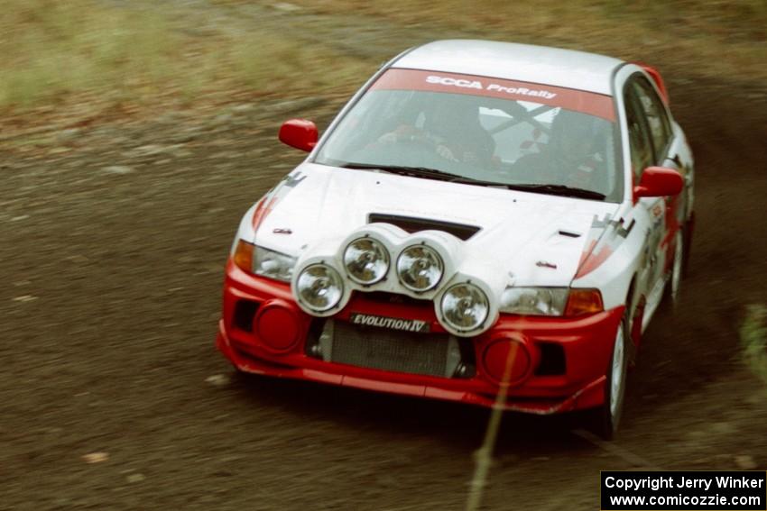 John Keaney / Eddie Fries Mitsubishi Lancer Evo IV near the start of SS1, Herman.