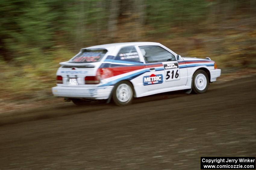 Chris Huntington / Doug Bradford Mazda 323GTX near the start of SS1, Herman.