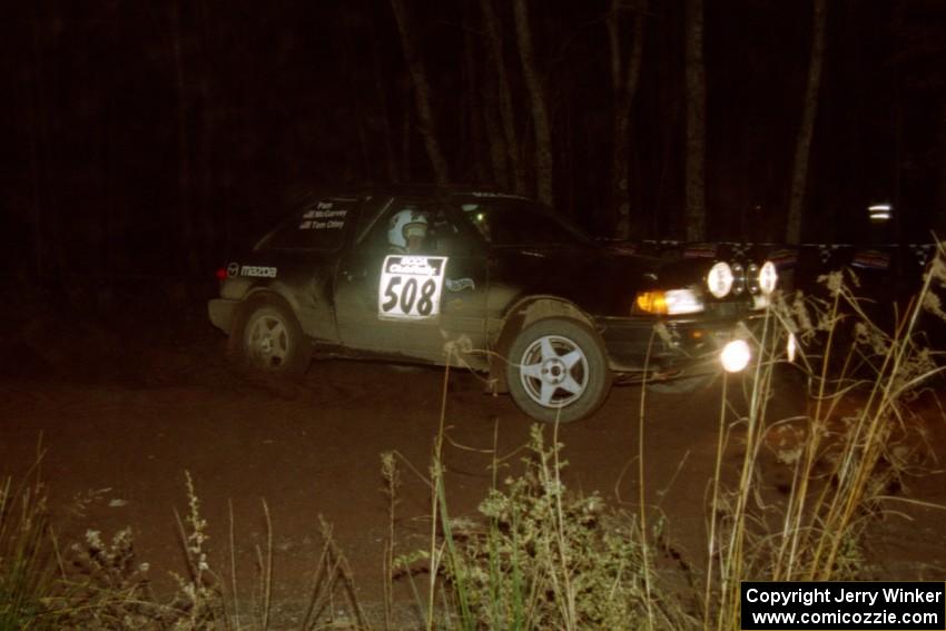 Tom Ottey / Pam McGarvey Mazda 323GTX on SS3, Estes Lake.