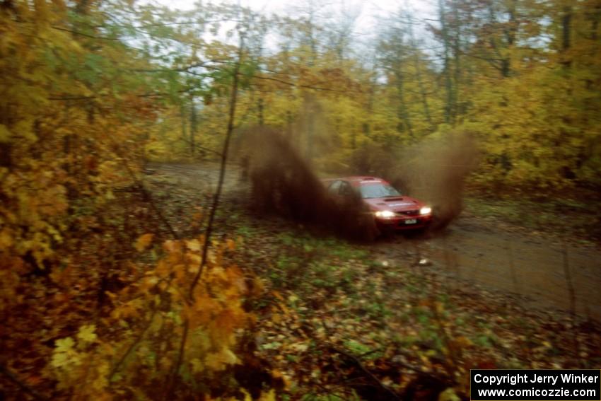 Erik Schmidt / Larry Schmidt Subaru Impreza on SS8, Gratiot Lake.