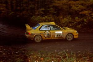 Tim O'Neil 	/ Martin Headland Subaru Impreza at the first corner of SS15, Gratiot Lake II.