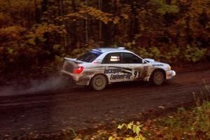 Jonathan Bottoms / Carolyn Bosley Subaru WRX at the first corner of SS15, Gratiot Lake II.