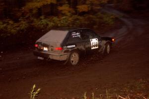 Tom Ottey / Pam McGarvey Mazda 323GTX at the first corner of SS15, Gratiot Lake II.