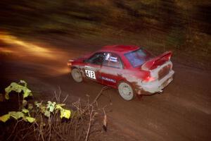 Erik Schmidt / Larry Schmidt Subaru Impreza at the first corner of SS15, Gratiot Lake II.