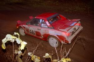 Phil Schmidt / Steve Irwin Toyota MR2 at the first corner of SS15, Gratiot Lake II.