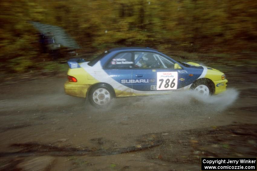 Joan Hoskinson / Adrian Wintle Subaru Impreza 2.5RS on SS8, Gratiot Lake.