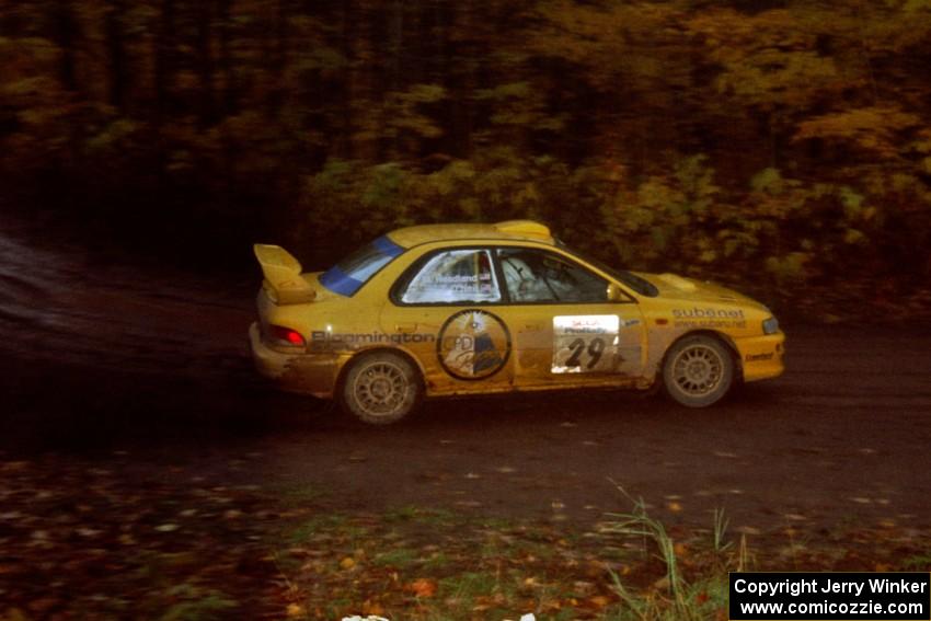 Tim O'Neil 	/ Martin Headland Subaru Impreza at the first corner of SS15, Gratiot Lake II.