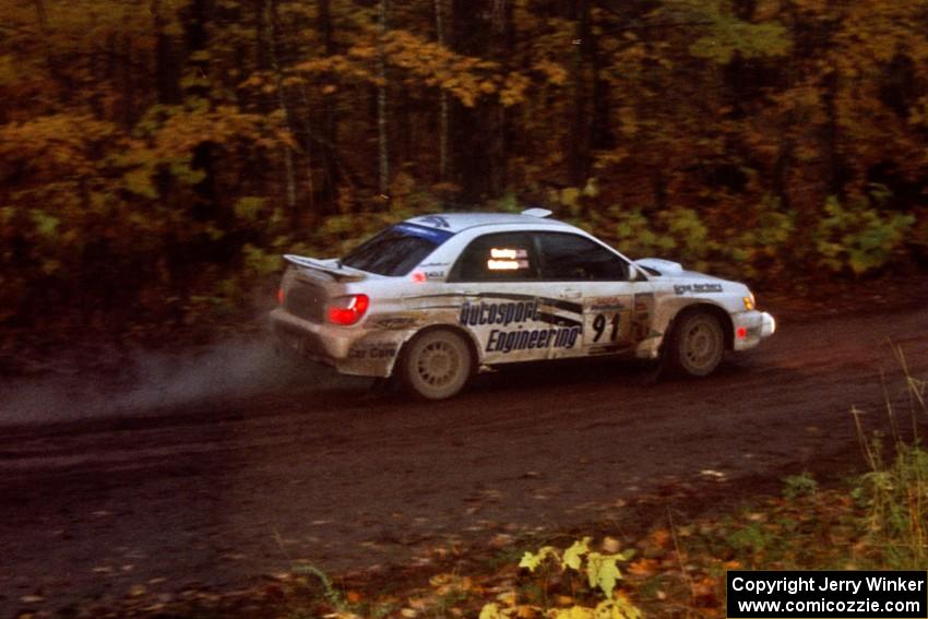 Jonathan Bottoms / Carolyn Bosley Subaru WRX at the first corner of SS15, Gratiot Lake II.