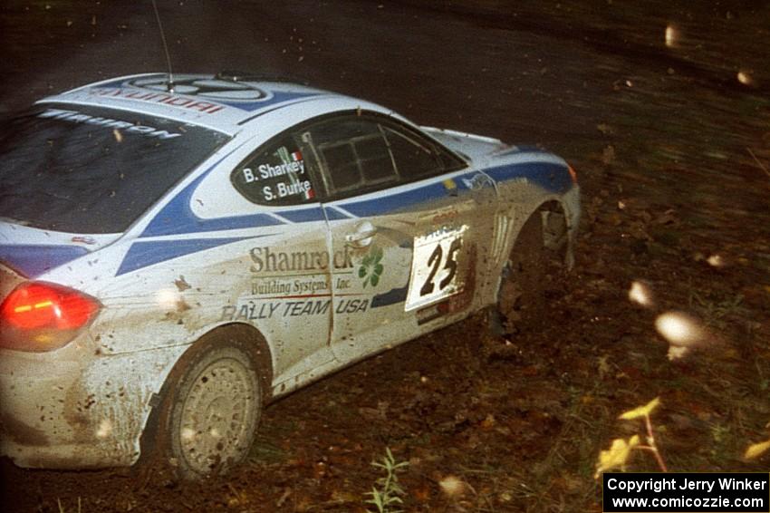 Seamus Burke / Brian Sharkey Hyundai Tiburon slides off at the first corner of SS15, Gratiot Lake II.