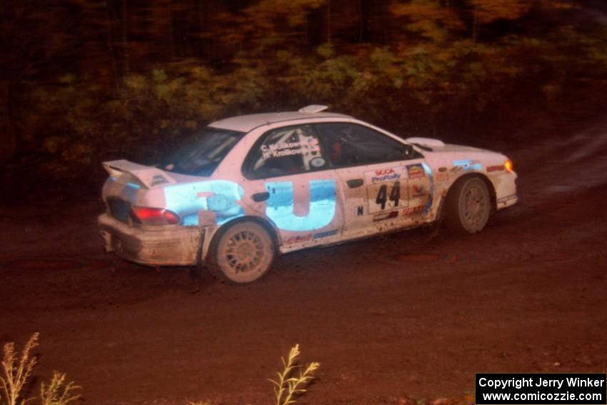 Henry Krolikowski / Cindy Krolikowski Subaru WRX at the first corner of SS15, Gratiot Lake II.