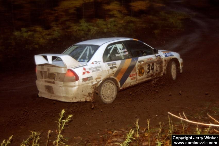 Pete Lahm / Bill Westrick Mitsubishi Lancer Evo IV at the first corner of SS15, Gratiot Lake II.