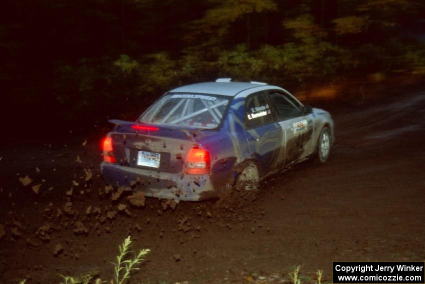 Eric Burmeister / Dave Shindle Mazda Protege MP3 at the first corner of SS15, Gratiot Lake II.