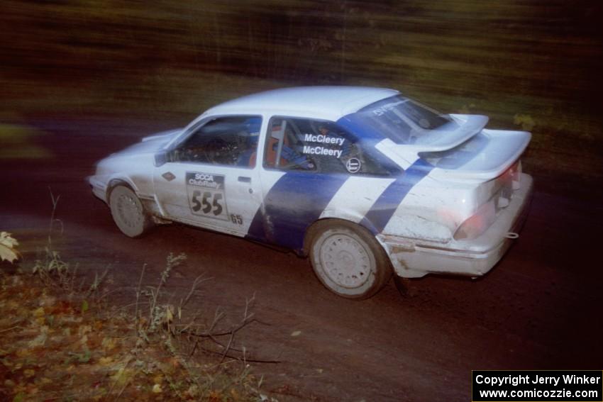 Colin McCleery / Nancy McCleery Ford Merkur XR4Ti at the first corner of SS15, Gratiot Lake II.