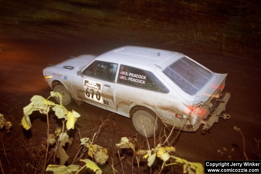 Steve Peacock / Liz Peacock Toyota Corolla at the first corner of SS15, Gratiot Lake II.