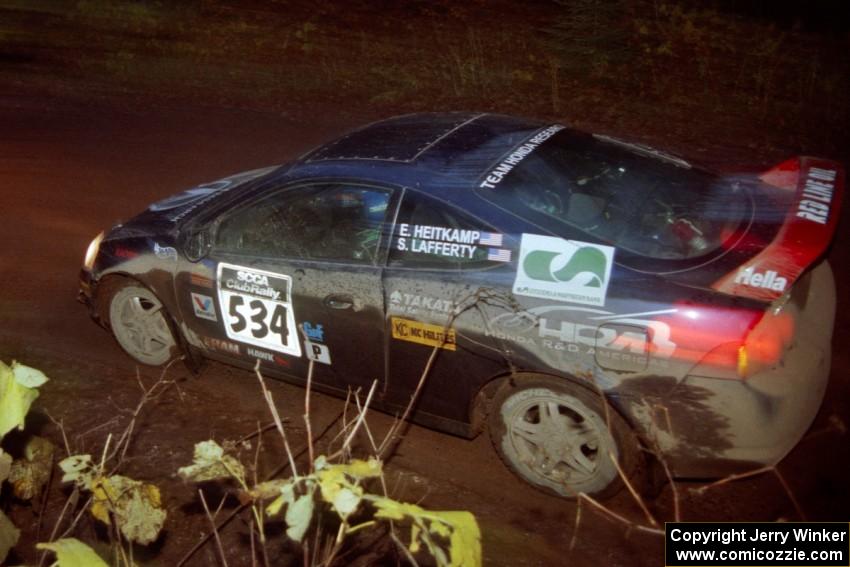 Eric Heitkamp / Shannon Lafferty Acura RSX at the first corner of SS15, Gratiot Lake II.