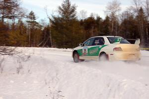 Seamus Burke / Jason Gillespie Mitsubishi Lancer Evo 8 blast down the first straight on the ranch stage.