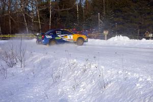 Pat Richard / Nathalie Richard Subaru WRX STi at a hairpin on the ranch stage.