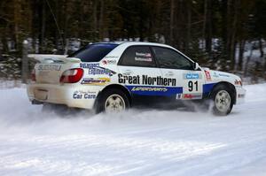 Jonathan Bottoms / Carolyn Bosley Subaru WRX exits out of a hairpin on the ranch stage.