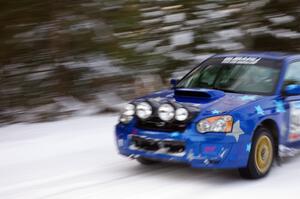 William Bacon / Peter Watt Subaru WRX STi at speed on a straight on the ranch stage.