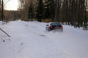 Chris Whiteman / Mike Rossey blast down a straight at the ranch stage in their Dodge SRT-4 .