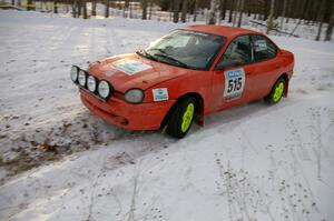 Adam Boullion / Phil Boullion Dodge Neon on the ranch stage on day one of the rally.