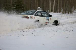 Joel Sanford / Jeff Hribar Chevy Cavalier throws a perfect dust plume while exiting a left-hander on the ranch stage.