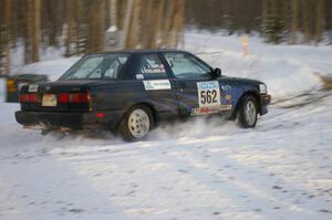 Brian Dondlinger / Dave Parps drift through a left-hander on the ranch stage in their Nissan Sentra SE-R.