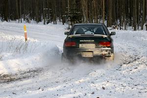 Mark Podoluch / Kazimierz Pudelek Subaru Impreza nail a slippery hairpin on the ranch stage beautifully.