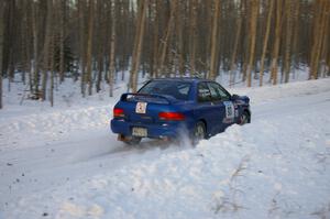 Bob Olson / Conrad Ketelsen lost time stuck in a snowbank in the early stages of day one in their Subaru Impreza 2.5RS.