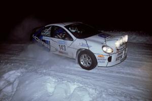 The Chris Whiteman / Mike Rossey Dodge SRT-4 drifts through the first corner of the evening running of the ranch stage.