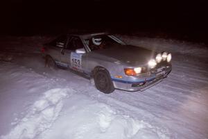 The Eric Langbein / Jeremy Wimpey Toyota All-Trac drifts through the first corner of the evening running of the ranch stage.