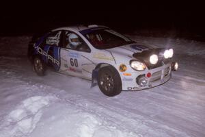 The Bruce Davis / Jimmy Brandt Dodge SRT-4 drifts through the first corner of the evening running of the ranch stage.