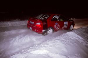 The John Cirisan / Josh Hamacher Subaru WRX drifts through the first corner of the evening running of the ranch stage.