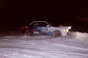 The Otis Dimiters / Peter Monin Subaru WRX STi drifts wide and nearly stuffs it through the first corner of the ranch stage.