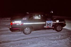 The Mike Merbach / Jeff Feldt VW Jetta drifts through the first corner of the evening running of the ranch stage.