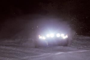 The Ken Block / Christian Edstrom Subaru WRX STi drifts wide through the first corner of the evening running of the ranch stage.