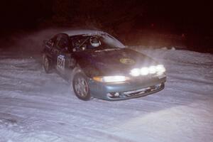 The Adam Markut / John Nordlie Eagle Talon drifts through the first corner of the evening running of the ranch stage.